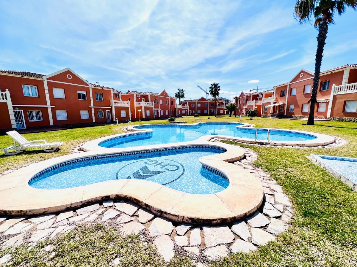Oliva Nova Beach & Golf Resort Club Sevilla VI Bagian luar foto